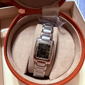 Silver women Ebel/Movado Watch. This watch has never been worn.